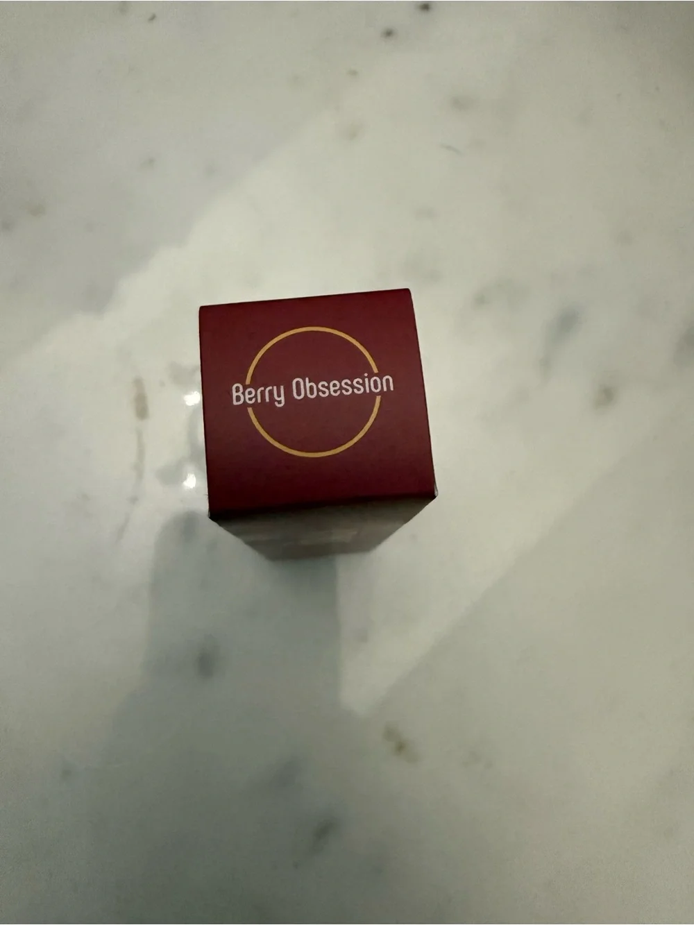 Plum-Colored Cosmetic Box with Gold Emblems